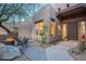 Welcoming outdoor space featuring a cozy fire pit, comfortable seating, and desert landscaping at 3405 E Knox Rd, Phoenix, AZ 85044