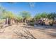 Charming single-story home featuring a neutral stucco exterior, desert landscaping, and a private entrance at 3405 E Knox Rd, Phoenix, AZ 85044