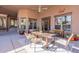 Charming outdoor patio with a spacious dining area, perfect for entertaining guests and enjoying the outdoors at 3405 E Knox Rd, Phoenix, AZ 85044