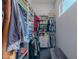 Walk-in closet with organized shelving and hanging space at 3405 E Knox Rd, Phoenix, AZ 85044