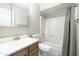 Functional bathroom with lots of natural light featuring a shower and vanity sink combination at 3821 W Woodridge Dr, Glendale, AZ 85308