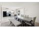 Open dining area next to the kitchen featuring neutral walls and a view to the patio at 3821 W Woodridge Dr, Glendale, AZ 85308