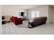 Bright living room with tile flooring and plush carpet, perfect for relaxation at 3821 W Woodridge Dr, Glendale, AZ 85308