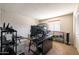 Dedicated home office space with multiple monitors, lots of room for computer setups and desk space at 3821 W Woodridge Dr, Glendale, AZ 85308
