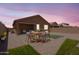 Relax in your private backyard with space to dine and a covered patio, ideal for outdoor enjoyment at 3847 S 63Rd Dr, Phoenix, AZ 85043