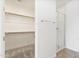 Bathroom featuring a walk-in closet with a full tile shower at 3847 S 63Rd Dr, Phoenix, AZ 85043