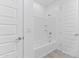 Full bathroom featuring a tub with tiled backsplash and shower combo at 3847 S 63Rd Dr, Phoenix, AZ 85043