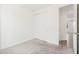 Neutral bedroom showcasing a sliding closet door, neutral carpet, and white walls at 3847 S 63Rd Dr, Phoenix, AZ 85043