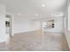 Bright and spacious living room with tile flooring and open floor plan at 3847 S 63Rd Dr, Phoenix, AZ 85043