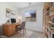The home office features modern built ins, natural light and is ideal for remote work or studying at 3847 S 63Rd Dr, Phoenix, AZ 85043
