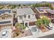 Aerial view of a two-story home with tile roof and desert landscaping in a residential neighborhood at 4328 W Judson Dr, New River, AZ 85087
