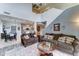 Open-concept living room featuring high ceilings and easy access to dining and kitchen areas at 4328 W Judson Dr, New River, AZ 85087
