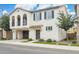 Charming two-story home featuring an arched entry and a two-car garage, complemented by professionally landscaped front yard at 4353 E Erie St, Gilbert, AZ 85295