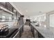 Kitchen featuring sleek stainless steel appliances and granite countertops offering a blend of style and functionality at 4353 E Erie St, Gilbert, AZ 85295
