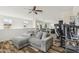 Upstairs living area featuring a sectional sofa, dining table, and open access to the kitchen at 4353 E Erie St, Gilbert, AZ 85295