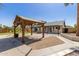 Beautiful backyard features a gazebo, covered patio, and attractive landscaping at 45 S Rita Ln, Chandler, AZ 85226