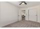 Bedroom featuring neutral tones, carpet flooring, and double door closet at 45 S Rita Ln, Chandler, AZ 85226