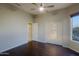A bedroom featuring a ceiling fan, and wood floors at 5520 E Desert Forest Trl, Cave Creek, AZ 85331