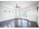 Bright bedroom with hardwood floors and views from the windows at 5520 E Desert Forest Trl, Cave Creek, AZ 85331
