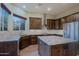Kitchen featuring granite countertops, stone backsplash, and stainless steel appliances at 5520 E Desert Forest Trl, Cave Creek, AZ 85331