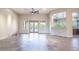 Spacious living room featuring tile floors, large windows, and an open layout at 5520 E Desert Forest Trl, Cave Creek, AZ 85331