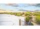 Outdoor patio with wrought iron railing offering scenic mountain views with lush desert foliage at 5520 E Desert Forest Trl, Cave Creek, AZ 85331