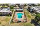 Overhead view of the community pool, surrounding landscaping, and nearby residences at 600 S Dobson Rd # 178, Mesa, AZ 85202