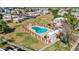 Aerial shot of the community pool, surrounding landscaping, and neighborhood at 600 S Dobson Rd # 178, Mesa, AZ 85202