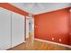 Bedroom with laminate wood floors and closet to the left at 600 S Dobson Rd # 178, Mesa, AZ 85202