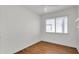 Bedroom with laminate wood floors and window to let in natural light at 600 S Dobson Rd # 178, Mesa, AZ 85202