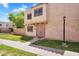 Charming two-story townhouse with a well-maintained lawn and neutral paint at 600 S Dobson Rd # 178, Mesa, AZ 85202