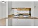 A view of the kitchen with matching countertops and a decorated breakfast bar with space for seating at 600 S Dobson Rd # 178, Mesa, AZ 85202