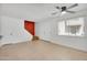 Bright living area with tiled floors, ceiling fan, and light colored walls at 600 S Dobson Rd # 178, Mesa, AZ 85202