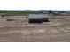 Expansive aerial view of new construction home and desert landscape with mountains in distance at 6262 S Dean Rd, Buckeye, AZ 85326