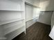 Walk-in closet with shelving units, providing ample storage space at 6262 S Dean Rd, Buckeye, AZ 85326