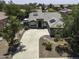 A stylish one-story home with solar panels and circular driveway at 651 W Cobblestone Dr, Casa Grande, AZ 85122