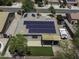 A bird's eye view reveals this home's solar panels, backyard, and landscaping at 651 W Cobblestone Dr, Casa Grande, AZ 85122