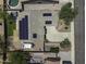Stunning aerial view of a home featuring solar panels, a pool, a hot tub, and a spacious driveway at 651 W Cobblestone Dr, Casa Grande, AZ 85122