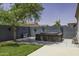 Backyard featuring a wooden hot tub and a gray block wall at 651 W Cobblestone Dr, Casa Grande, AZ 85122