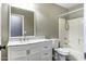 Bathroom with marble vanity and shower/tub combo at 651 W Cobblestone Dr, Casa Grande, AZ 85122