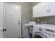 Laundry room with washer, dryer, and utility sink at 651 W Cobblestone Dr, Casa Grande, AZ 85122