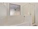 Elegant bathroom featuring a soaking tub and glass-enclosed shower for a spa-like experience at 6787 W Saddlehorn Rd, Peoria, AZ 85383