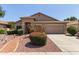 Charming single-story home featuring a two-car garage and well-maintained desert landscaping at 6787 W Saddlehorn Rd, Peoria, AZ 85383