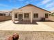 Spacious backyard with a covered patio, offering ample space for outdoor entertaining at 7316 E Fledgling Dr, Scottsdale, AZ 85255