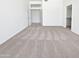 Spacious bedroom with neutral carpet and walk-in closet, offering a bright and airy atmosphere at 7316 E Fledgling Dr, Scottsdale, AZ 85255