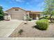 Well-maintained home with desert landscaping and a two-car garage at 7316 E Fledgling Dr, Scottsdale, AZ 85255