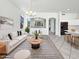 Bright living room with neutral decor, stylish furniture, and an open floor plan at 7316 E Fledgling Dr, Scottsdale, AZ 85255