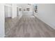 Open floor plan with tile and carpet flooring, natural light, and a view of the kitchen at 7316 E Fledgling Dr, Scottsdale, AZ 85255