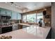 Bright kitchen featuring ample counter space, updated appliances and an undermount sink at 759 W Los Lagos Vista Ave, Mesa, AZ 85210