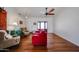 Bright living room with hardwood floors, ceiling fan, and lots of natural light at 759 W Los Lagos Vista Ave, Mesa, AZ 85210